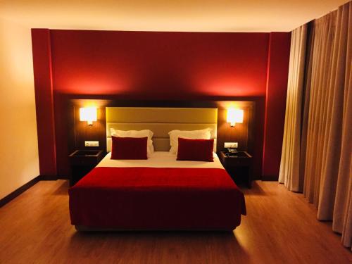Un ou plusieurs lits dans un hébergement de l'établissement Palace Hotel e SPA Monte Rio