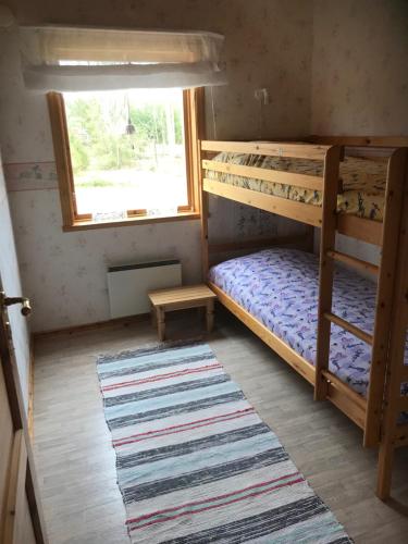 Säng eller sängar i ett rum på Värmlandsnäs Valdersrud Stenröse