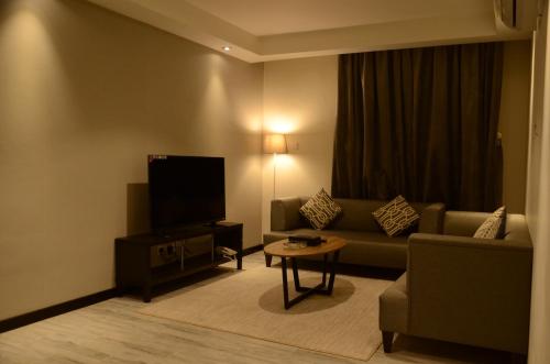Ruang duduk di منازل الشمال للشقق المخدومة Manazel Al Shamal Serviced Apartments
