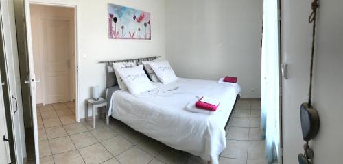 Ένα ή περισσότερα κρεβάτια σε δωμάτιο στο Villa Zénitude