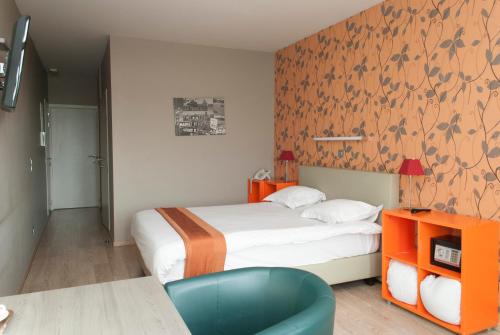 Postel nebo postele na pokoji v ubytování Hotel Castel