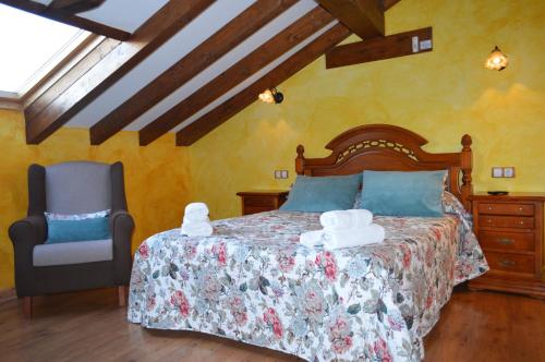 Katil atau katil-katil dalam bilik di Hotel Rural El Marqués