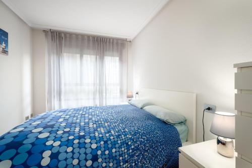 A bed or beds in a room at Arena en Perlora - VUT-735-AS