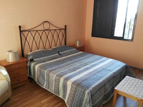 Postel nebo postele na pokoji v ubytování Donde Brilla el Sol
