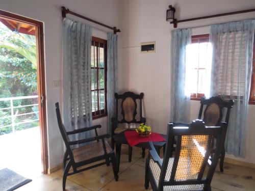 Χώρος καθιστικού στο Jungle Holiday Home