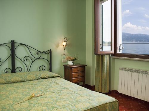 Postel nebo postele na pokoji v ubytování Hotel Garnì Bartabel