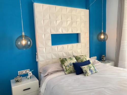 Postel nebo postele na pokoji v ubytování Duplex Villamarina