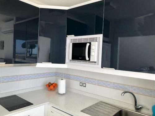 Kuchyň nebo kuchyňský kout v ubytování Duplex Villamarina