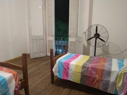 Hostal, home sweet homeにあるベッド