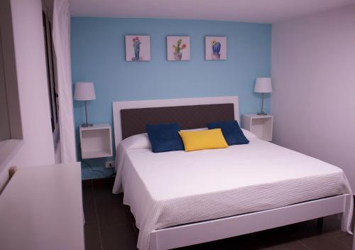 Кровать или кровати в номере La Caletta Casa Vacanze, PRIVATE POOL