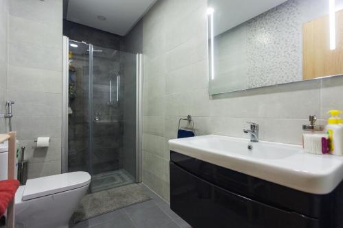Ванная комната в Miramar Residence Beach