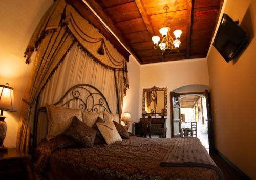 Katil atau katil-katil dalam bilik di Hotel La Catedral
