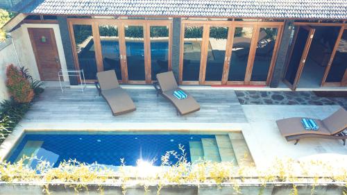 Πισίνα στο ή κοντά στο Gili Palms Villas