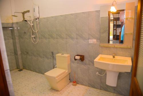 Ein Badezimmer in der Unterkunft Hotel Nadee