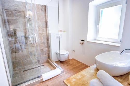 Un baño de ECO Aparthotel The Dreamers's Club
