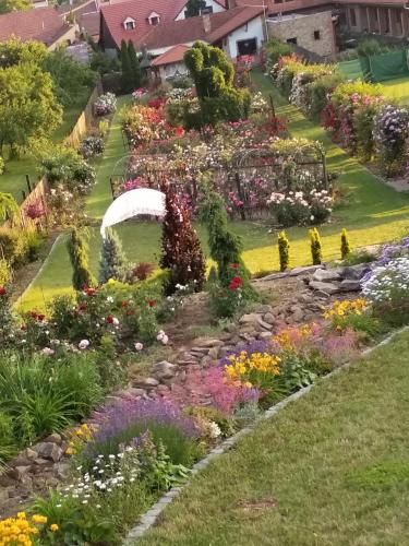a garden of flowers in a park at penzion ROSETA in Radějov