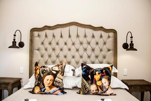 Ένα ή περισσότερα κρεβάτια σε δωμάτιο στο French Karoo Guesthouse