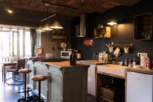 Kuchyň nebo kuchyňský kout v ubytování Gîte de Corbion loft2