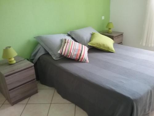 Cama o camas de una habitación en Appartement Abbazia proche Ghisonaccia