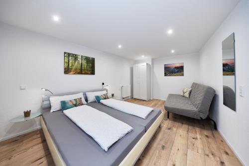 เตียงในห้องที่ Wohnung 7 - nur 5-10 min vom Europa-Park