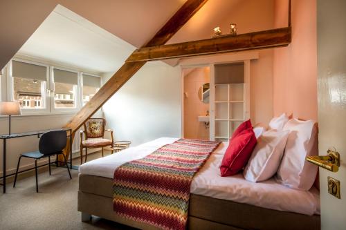 Postel nebo postele na pokoji v ubytování B&B Willem II