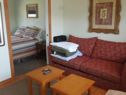 Ένα ή περισσότερα κρεβάτια σε δωμάτιο στο Sifting Sands Motel