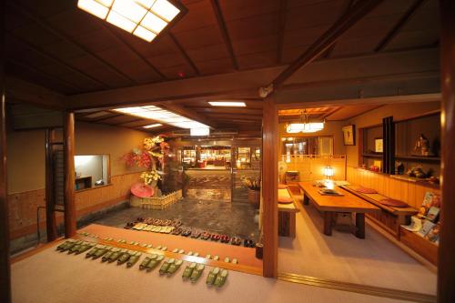an overhead view of a restaurant with a table and wine bottles at Morizuya in Toyooka