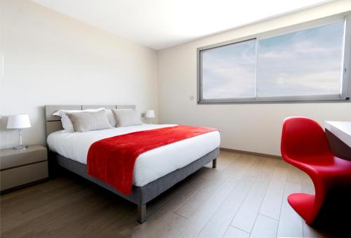 Кровать или кровати в номере Costa Nera