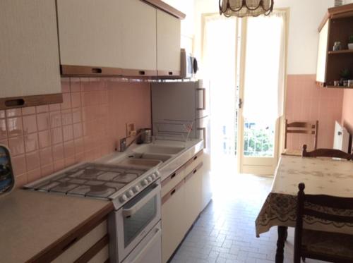 a kitchen with a stove and a counter top at Le Casone in Ajaccio