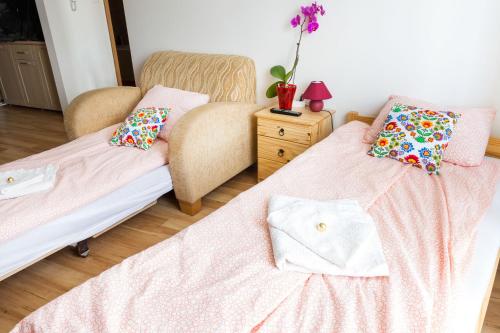 Postel nebo postele na pokoji v ubytování MSE Apartman