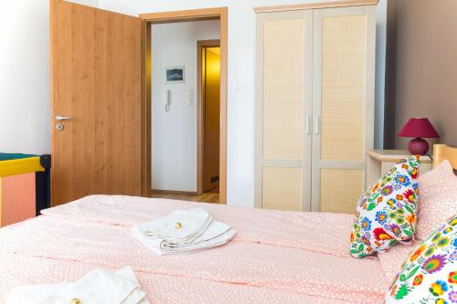 Postel nebo postele na pokoji v ubytování MSE Apartman