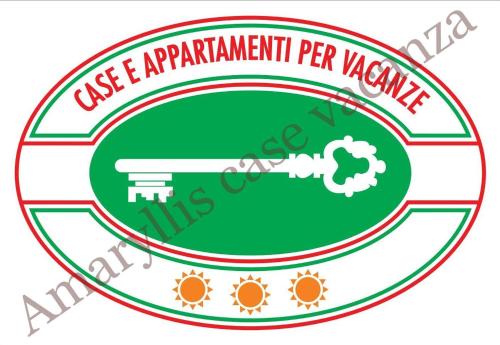 ein grünes Etikett mit Schloss und Schlüssel in der Unterkunft Amaryllis Case Vacanza in Il Romito