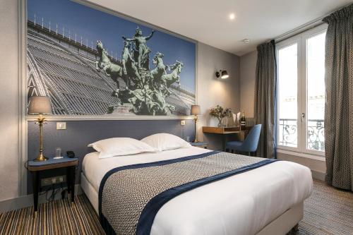 Ένα ή περισσότερα κρεβάτια σε δωμάτιο στο Hotel Saint Christophe