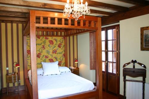 En eller flere senge i et værelse på Posada El Hidalgo