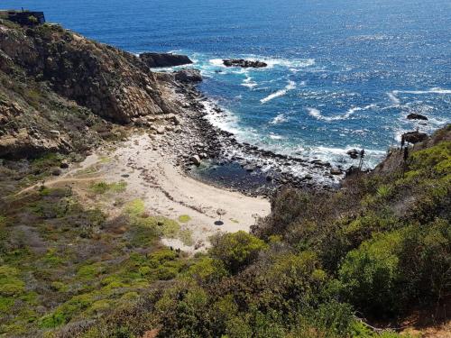 a view of a beach with the ocean at Tunquen Magico in Tunquen