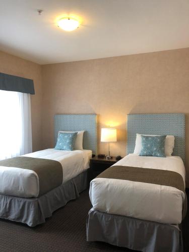 Prestige Cranbrook Hotel, BW Premier Collectionにあるベッド