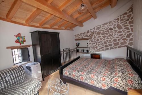 Giường trong phòng chung tại Casa Vacanza La Rocca