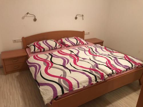 Postel nebo postele na pokoji v ubytování Apartma Ajda