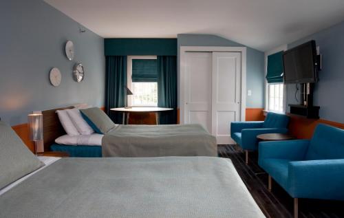 En eller flere senge i et værelse på The Maidstone Hotel