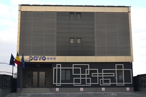 a building with araxo written on the side of it at Pensiune Pavo in Piteşti