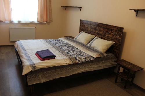 Кровать или кровати в номере Апартаменты на Каблукова