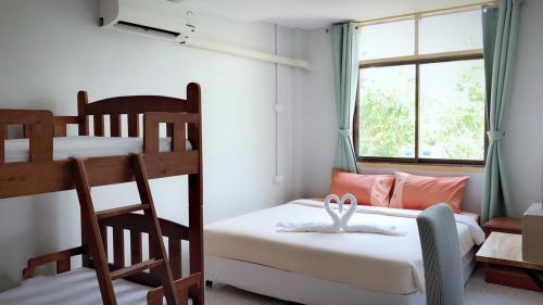 Postel nebo postele na pokoji v ubytování Ler Hostel 65