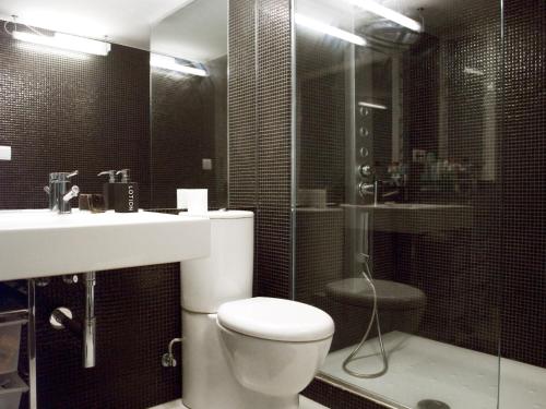 Koupelna v ubytování Oktheway Loft Maestranza