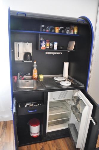 Dapur atau dapur kecil di Butzbach Hotel & apartment