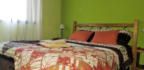 
Una cama o camas en una habitación de Aires de la Quebrada
