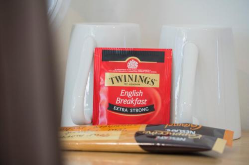 a packet of twines and a toothbrush in a drawer at Amazing Sea Views Luxury Guest House in Hobart