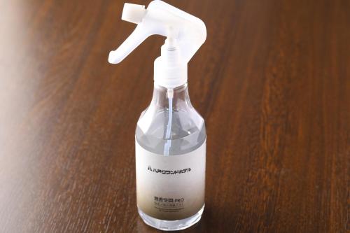 a glass bottle with a faucet on a table at Hachinohe Grand Hotel in Hachinohe