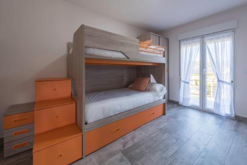 Двуетажно легло или двуетажни легла в стая в Apartamentos Turísticos el Pontón