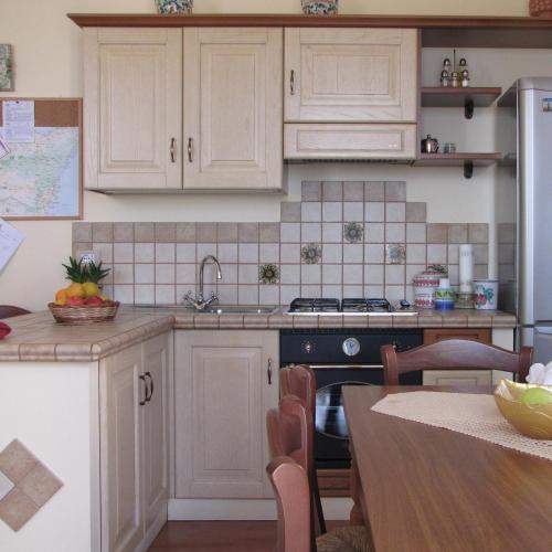 Kuchyň nebo kuchyňský kout v ubytování B&B Agon