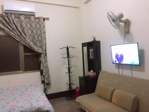 TV a/nebo společenská místnost v ubytování Dongguang Zhixing Homestay